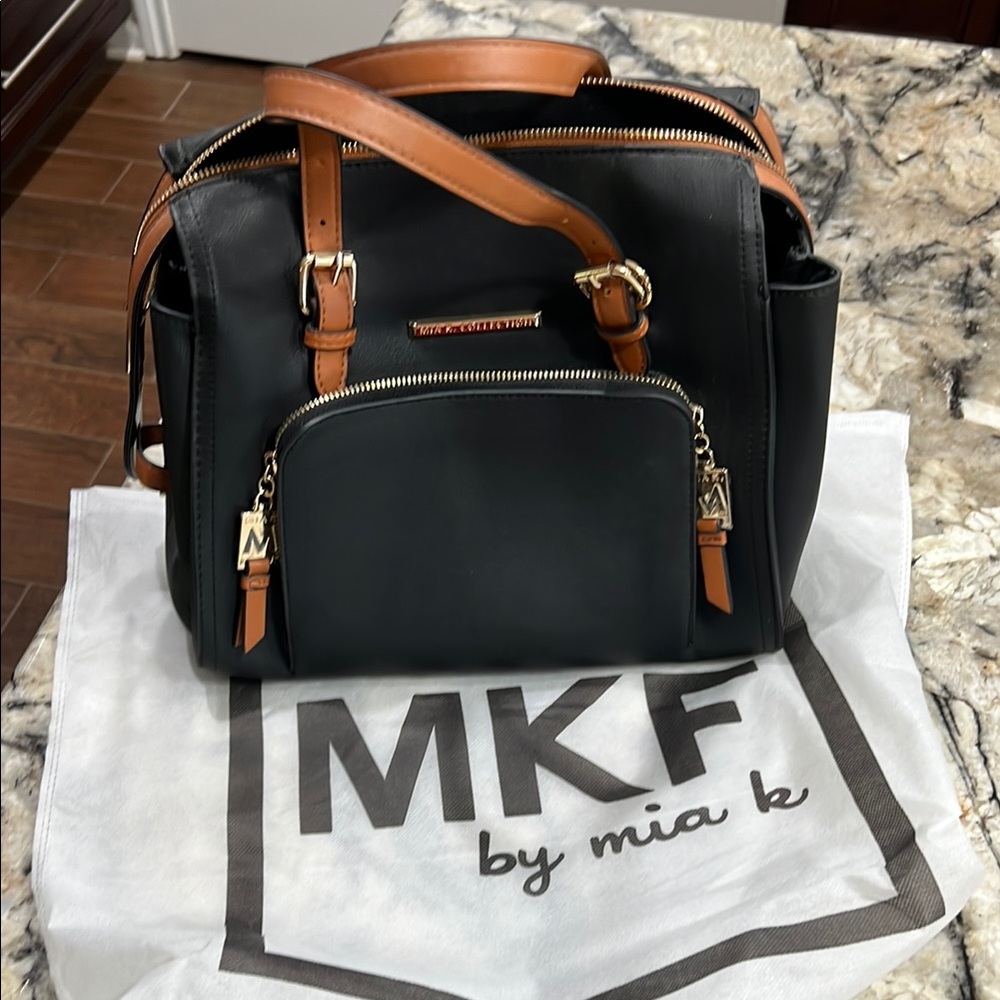 Michael Kors Black and Tan Satchel with Gold-Tone Details
